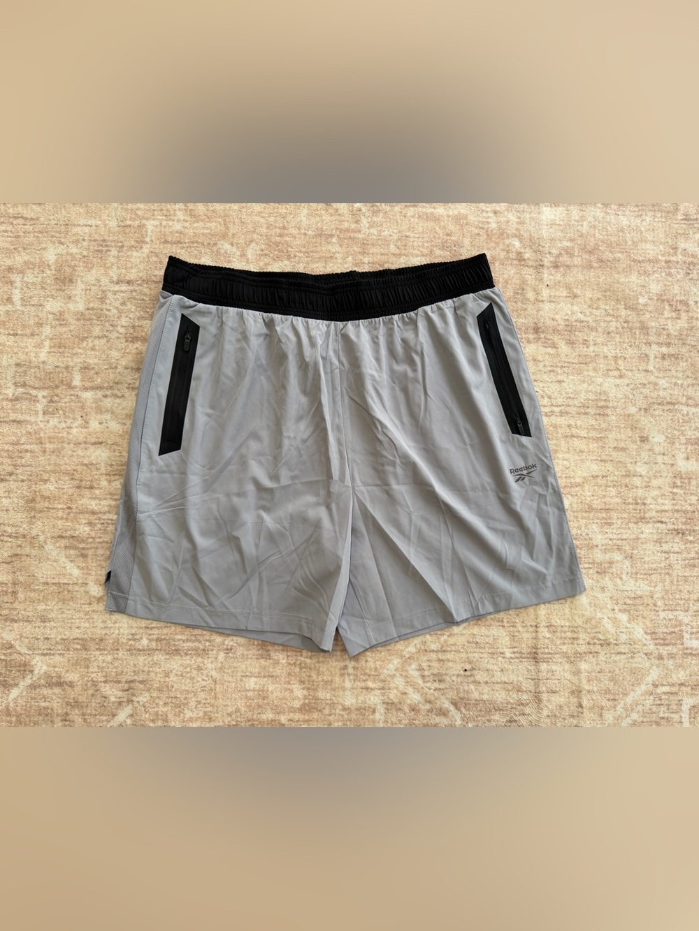 Reebok Men’s Light Gray Athletic Shorts with Black Waistband, no tags